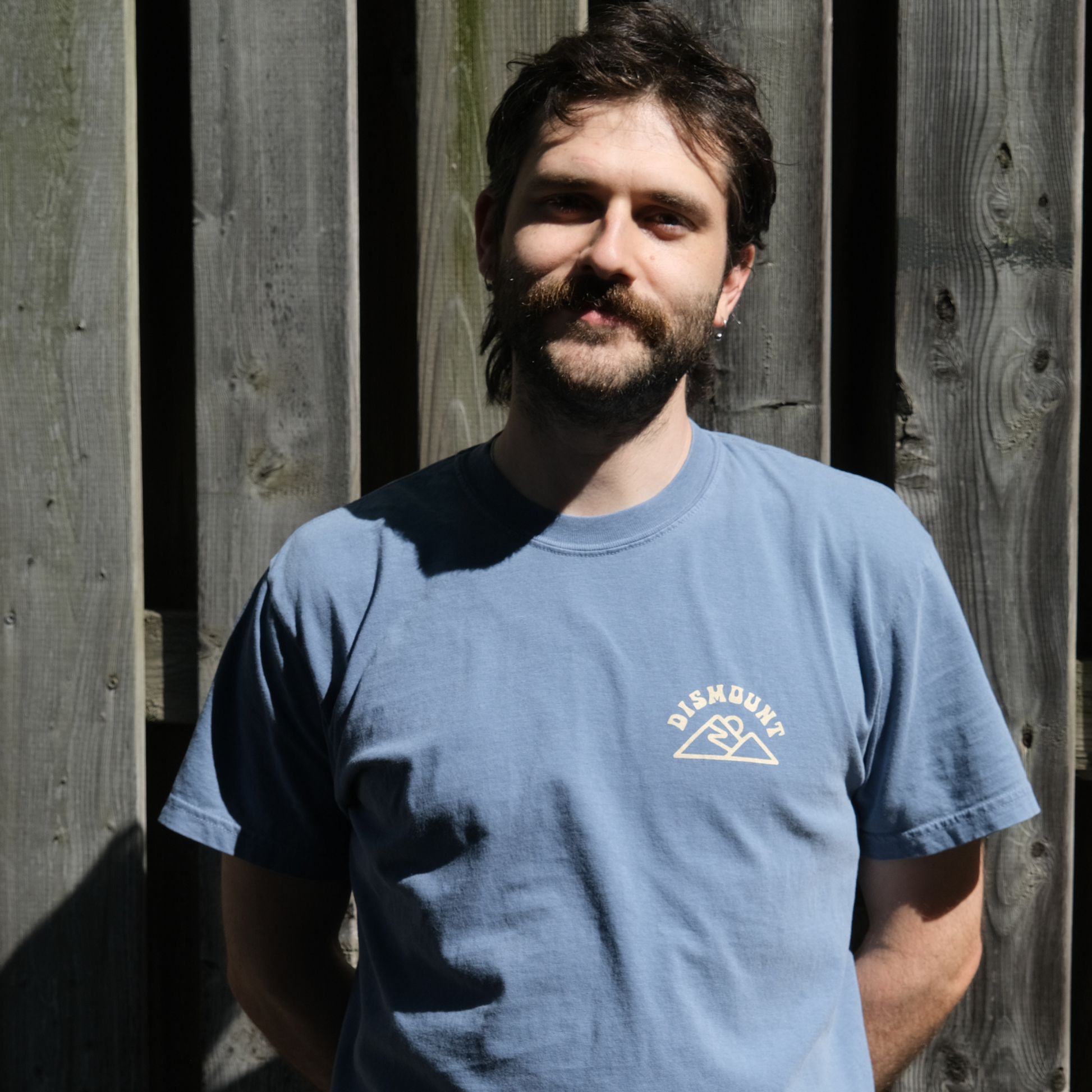 Dismount Mountain T-Shirt printed on the Comfort Colors 1717 Heavyweight Tee in Blue Jean.