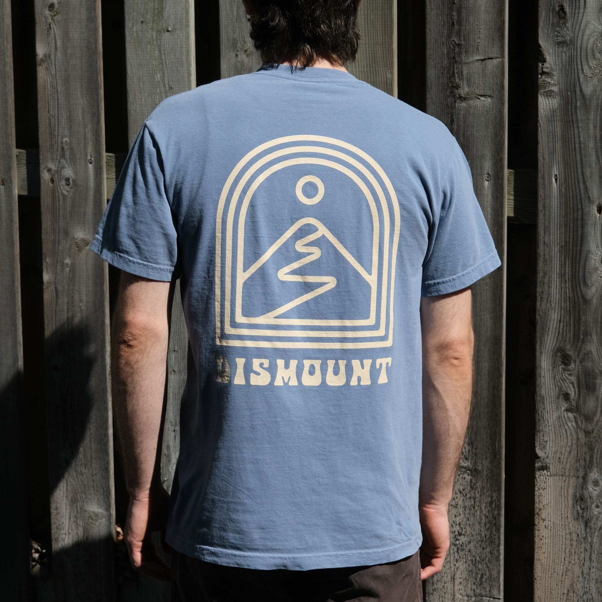 Dismount Mountain T-Shirt printed on the Comfort Colors 1717 Heavyweight Tee in  Blue Jean, back logo.