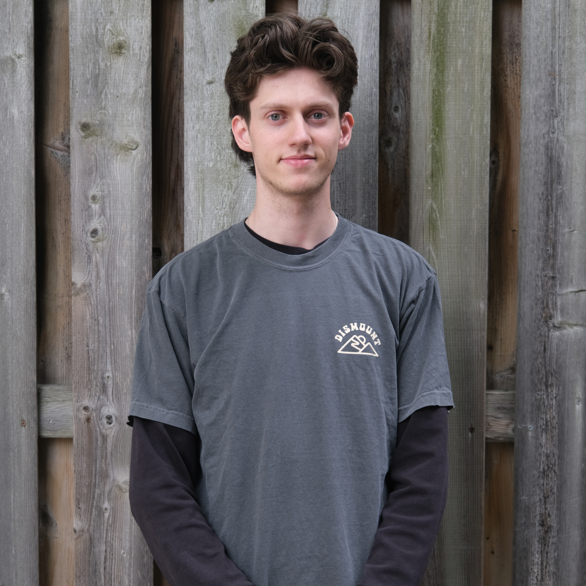 Dismount Mountain T-Shirt printed on the Comfort Colors 1717 Heavyweight Tee in Pepper.