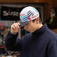 Blue Lug Original Cycle Cap in team jersey design. 100% cotton one size fits all.