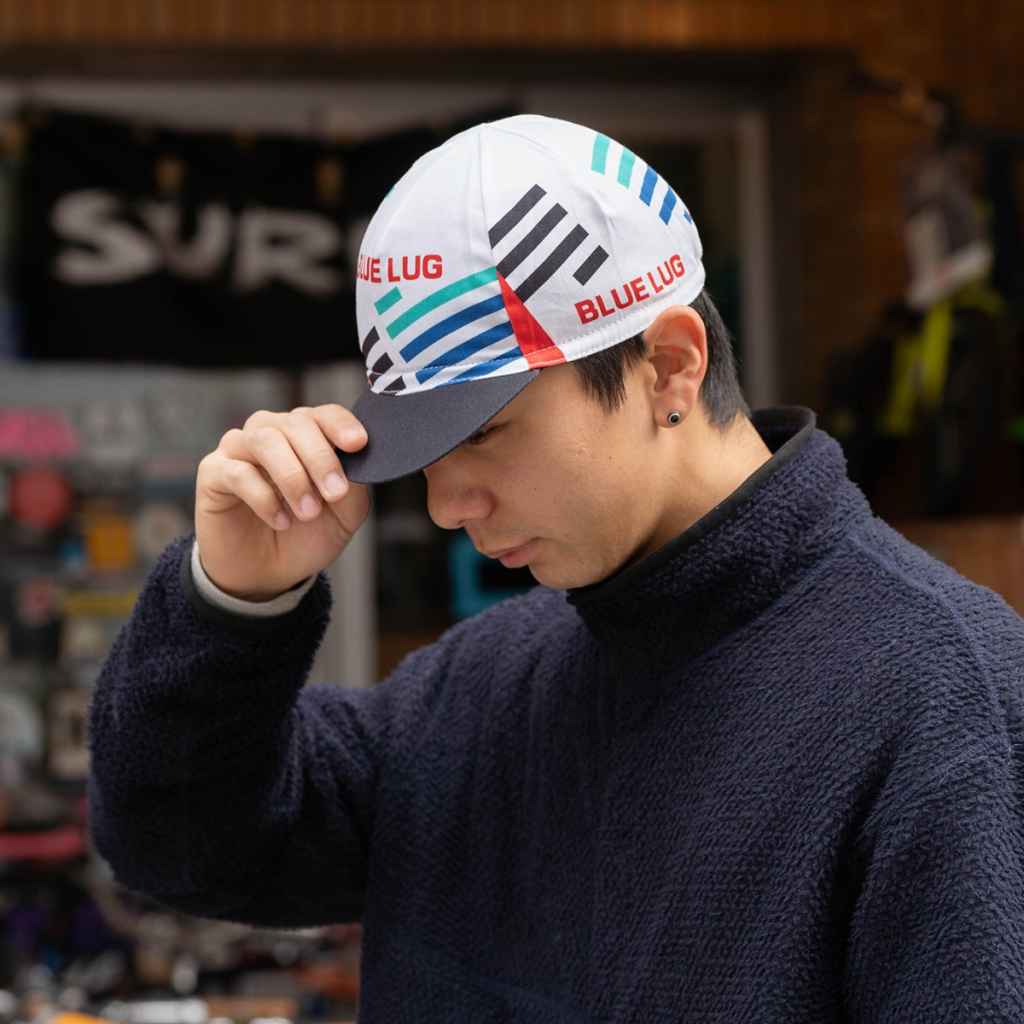 Blue Lug Original Cycle Cap in team jersey design. 100% cotton one size fits all.