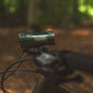 Exposure Lights MaXx-D 17 rechargeable front bicycle light with gunmetal grey CNC-machined aluminium body, 4850-lumen REFLEX output and colour OLED display.