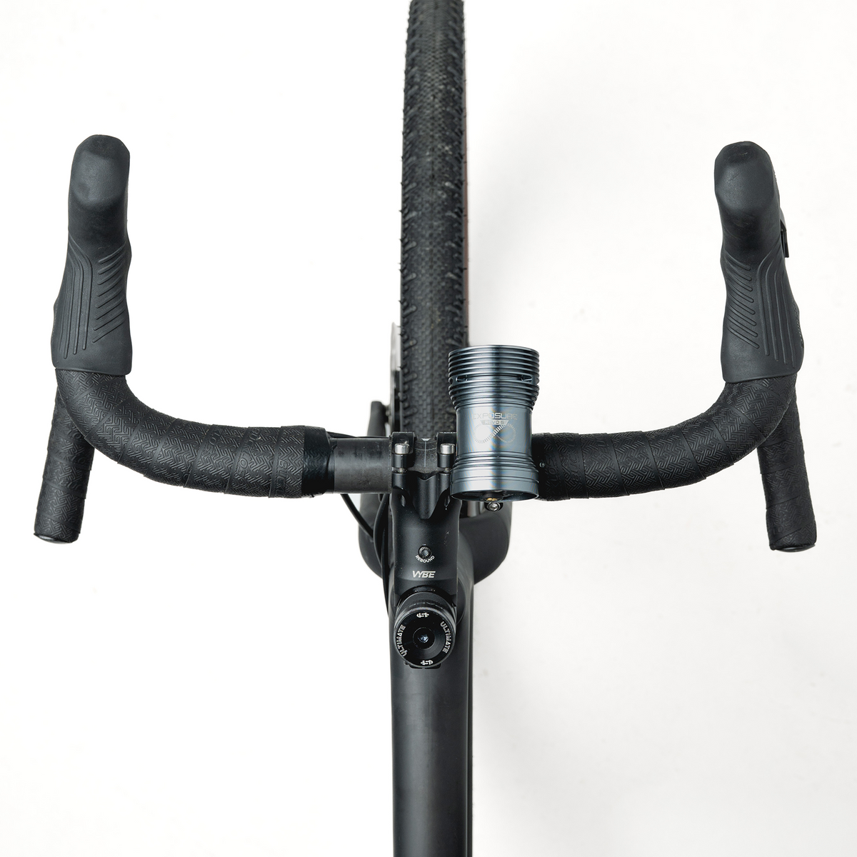 Exposure Lights Revo 5 2000-lumen dynamo-powered front bicycle light with CNC-machined aluminium body, integrated rechargeable battery and USB-C charging.