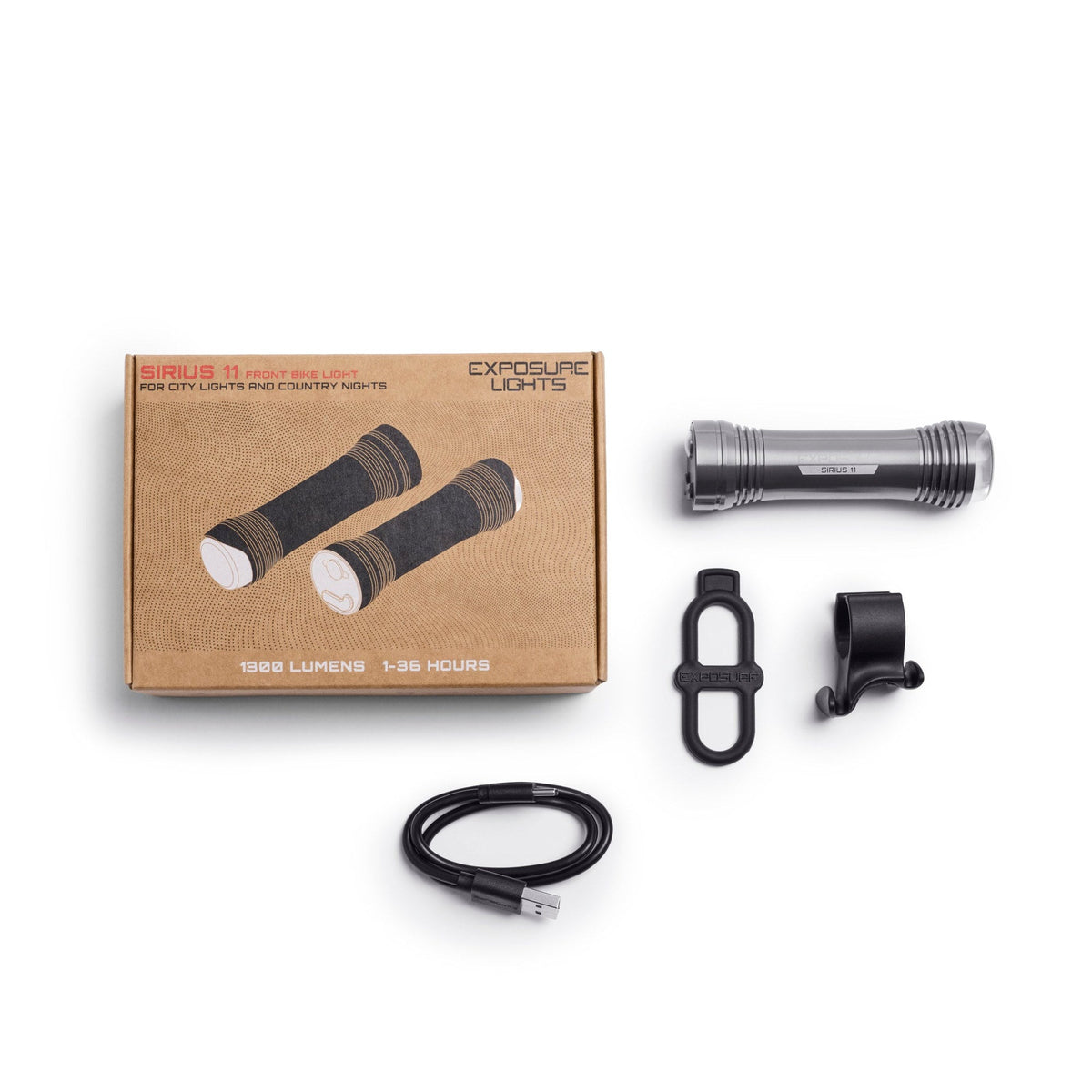 Exposure Lights Sirius 11 rechargeable front bicycle light with gunmetal grey CNC-machined aluminium body, 1300-lumen output and USB-C charging.
