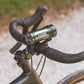Exposure Lights Toro 16 rechargeable front bicycle light with gunmetal grey CNC-machined aluminium body, 3850-lumen output, colour OLED display and REFLEX 2.0 technology.