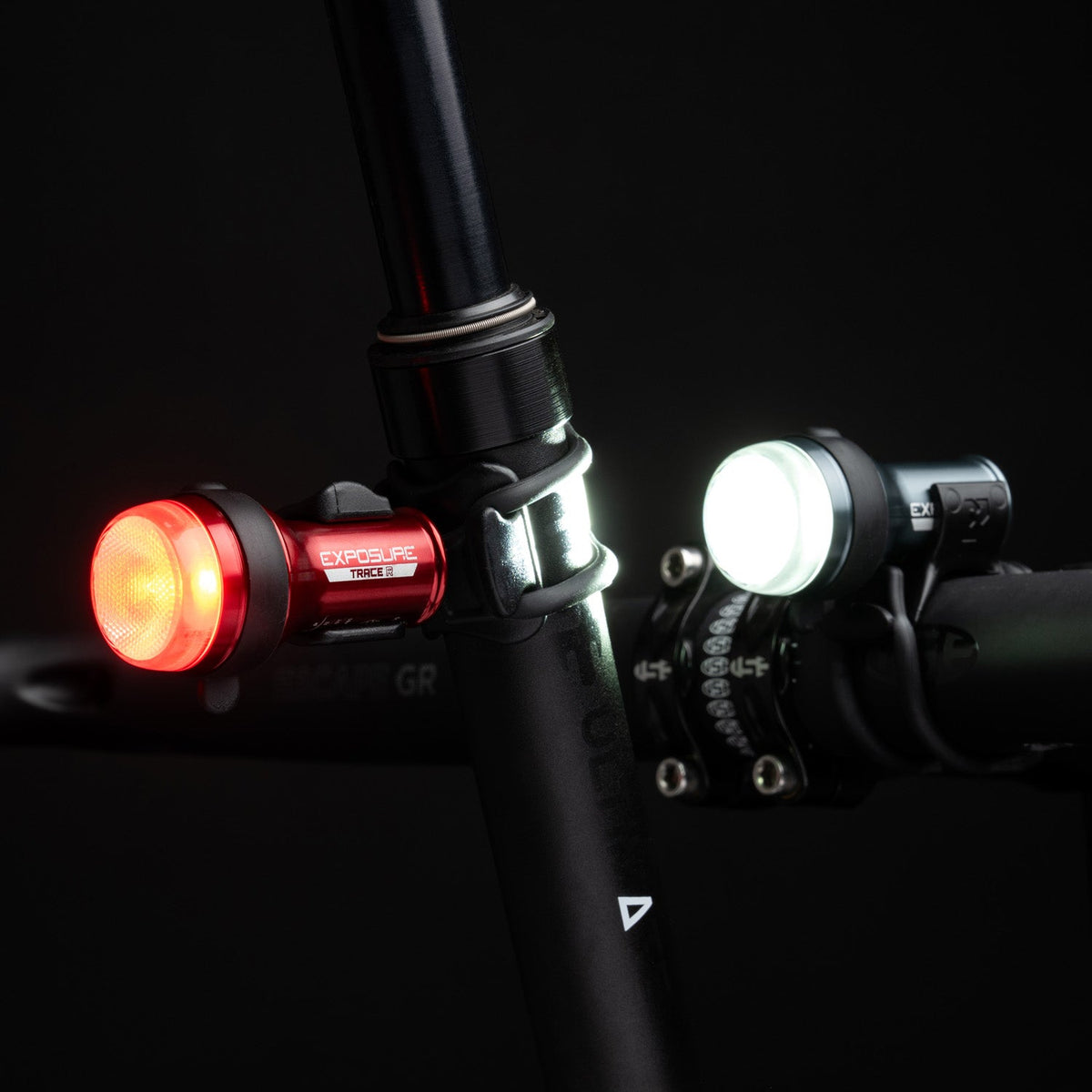 Exposure Lights Trace 4 and TraceR 4 ReAKT rechargeable front and rear bicycle light set with compact CNC-machined aluminium bodies and DayBright technology.