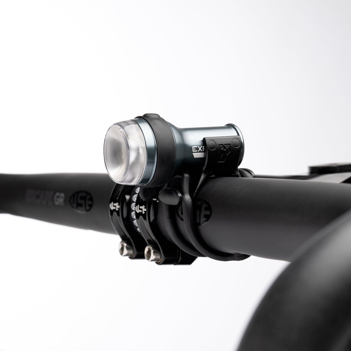 Exposure Lights Trace 4 and TraceR 4 ReAKT rechargeable front and rear bicycle light set with compact CNC-machined aluminium bodies and DayBright technology.