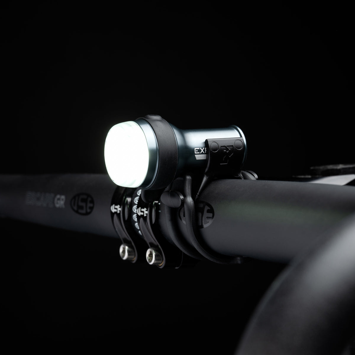 Exposure Lights Trace 4 and TraceR 4 ReAKT rechargeable front and rear bicycle light set with compact CNC-machined aluminium bodies and DayBright technology.