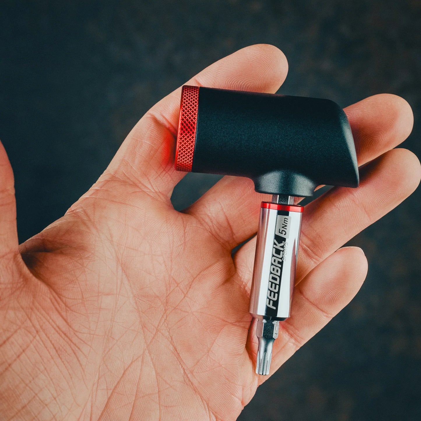 Feedback Sports Reflex fixed torque bit driver hold by a human hand