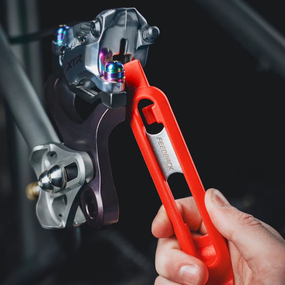 Feedback Sports Steel Core Tire Levers 2.0 used as a caliper's pistons opener 