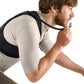 Man wearing a black backpack and beige shorts on a white background