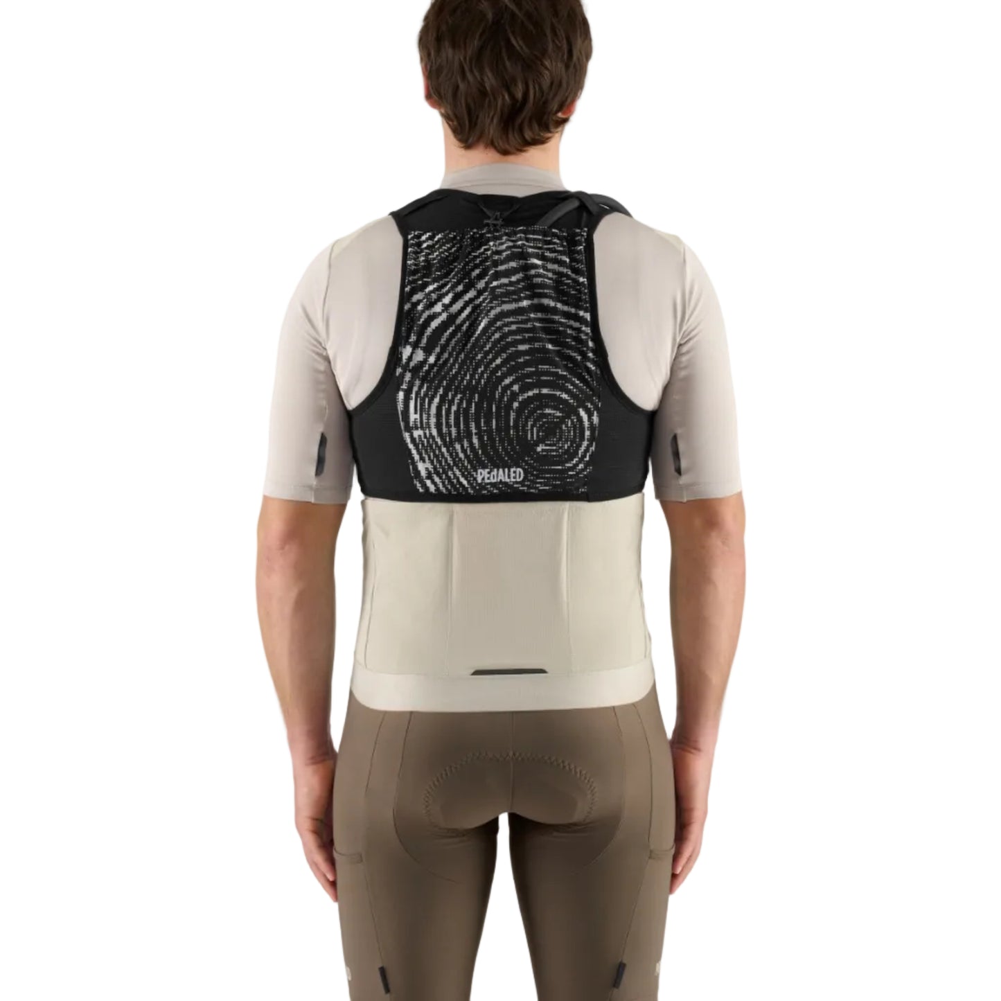 Person wearing a cycling outfit with a black and white back design on a gray background