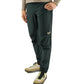 Dark green PeDaLED Yuma Trail Pants for trail riding, bikepacking and adventure cycling