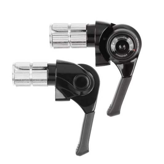 Close-up of microSHIFT bar end shifters with friction/indexed mode set