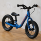Norco Runner 12 Blue balance bike front side view