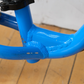 Norco Runner 12 Blue balance bike down tube view