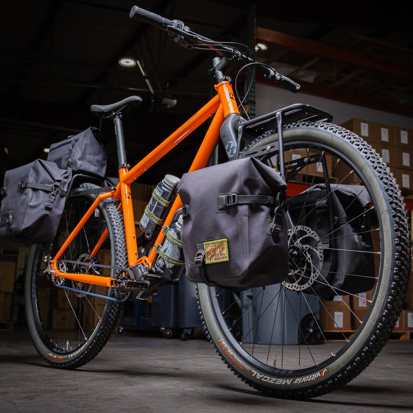 Old Man Mountain Impala Lowrider front bicycle rack with extra-low pannier rails, aluminum cargo deck and adjustable fit for wheels up to 29". Designed for bikepacking, adventures and cargo.