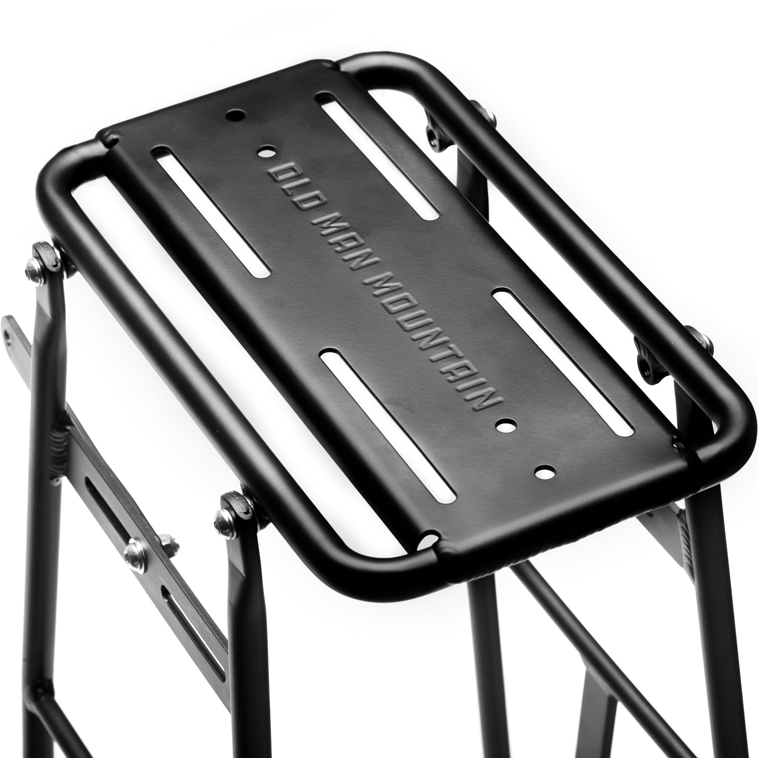 Old Man Mountain Impala Lowrider front bicycle rack with extra-low pannier rails, aluminum cargo deck and adjustable fit for wheels up to 29". Designed for bikepacking, adventures and cargo.