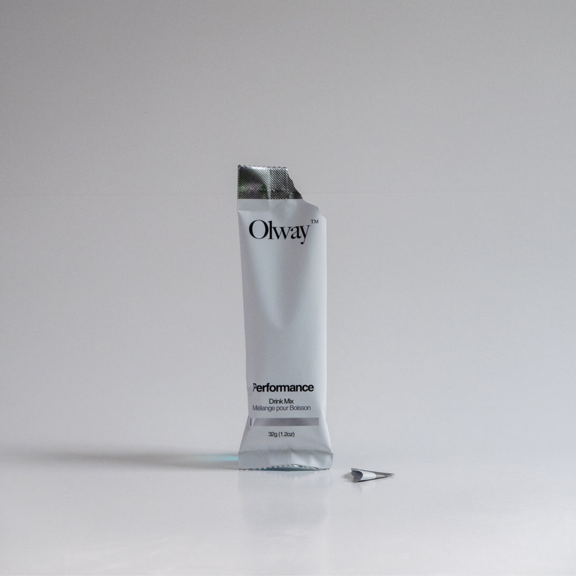 Olway performance drink mix single package on a gray background