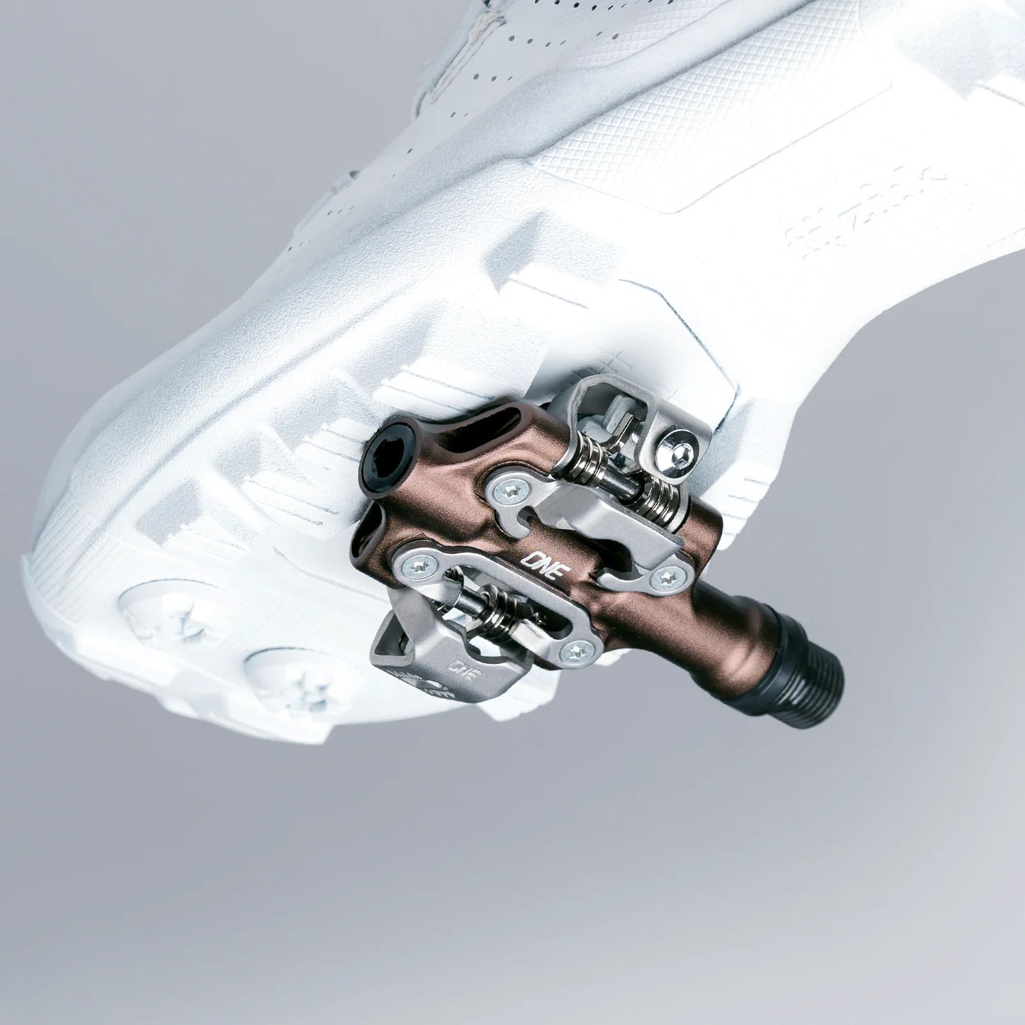 OneUp XC Clip Pedal attached to a cycling shoe