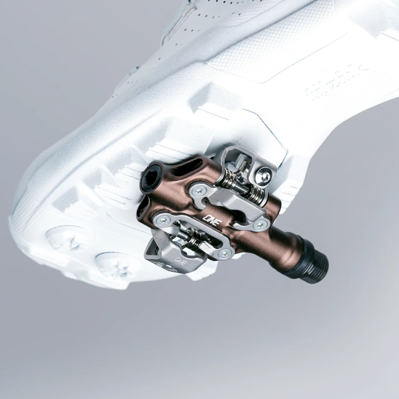 OneUp XC Clip Pedal attached to a cycling shoe