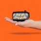 Outbound Lighting Trail Evo handlebar light being held in a hand.