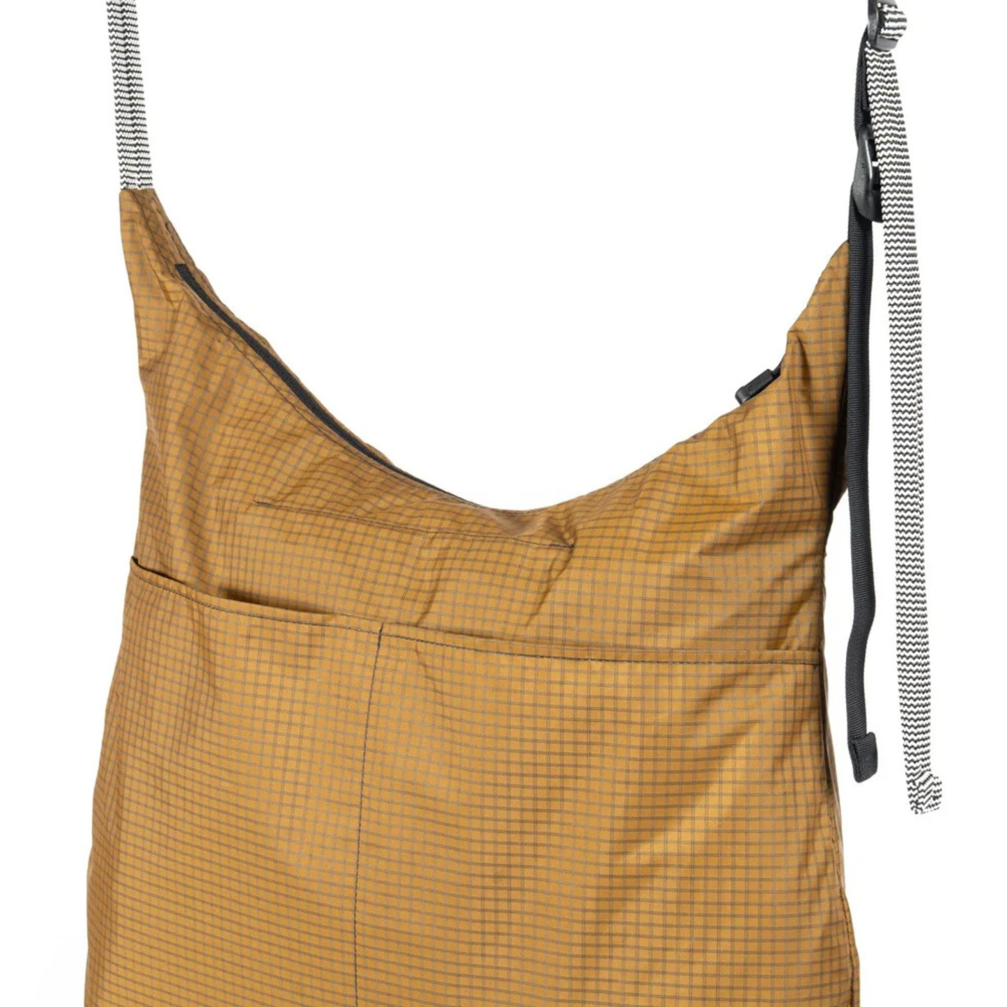 Outer Shell Magic Tote crossbody tote bag hanging from its belt