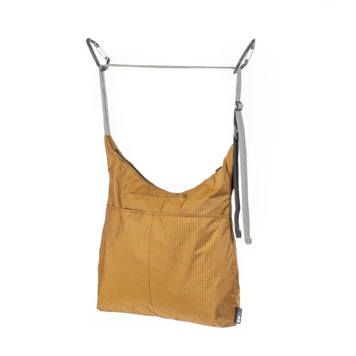 Outer Shell Magic Tote crossbody tote bag hanging complete view