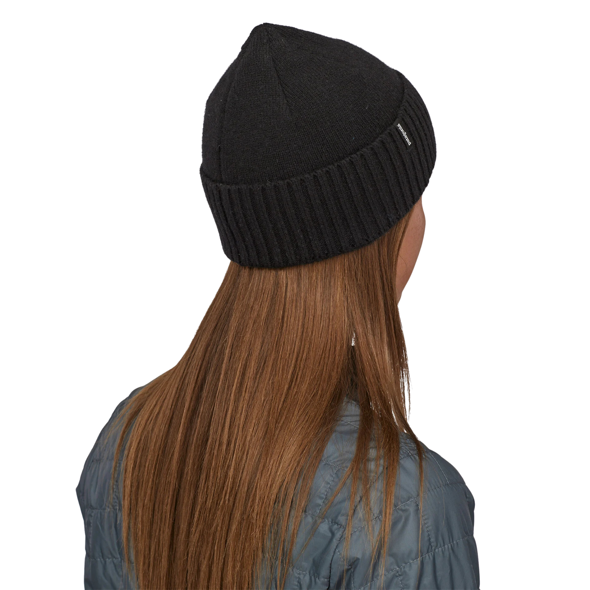 Patagonia Brodeo Beanie in Black colours angled view being worn.