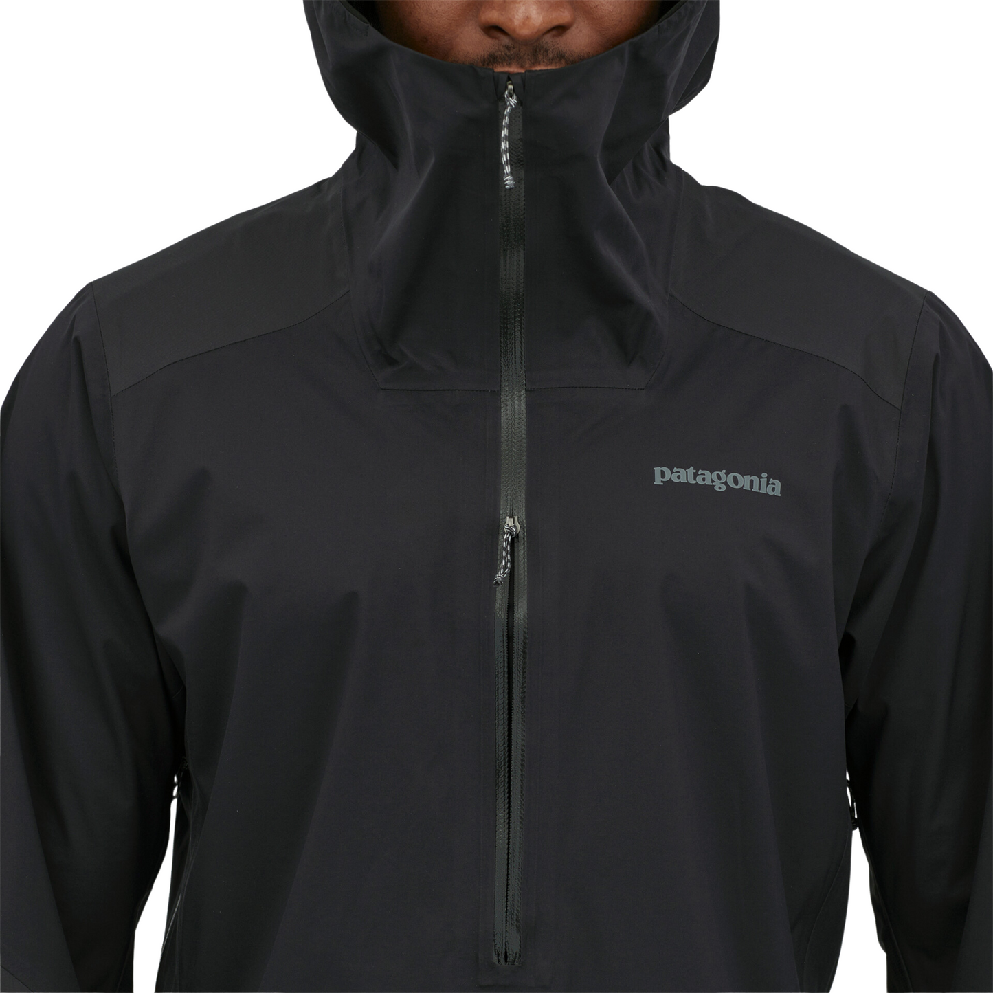 Patagonia Dirt Roamer Storm Bike Jacket in Black worn by model, front zipper detail