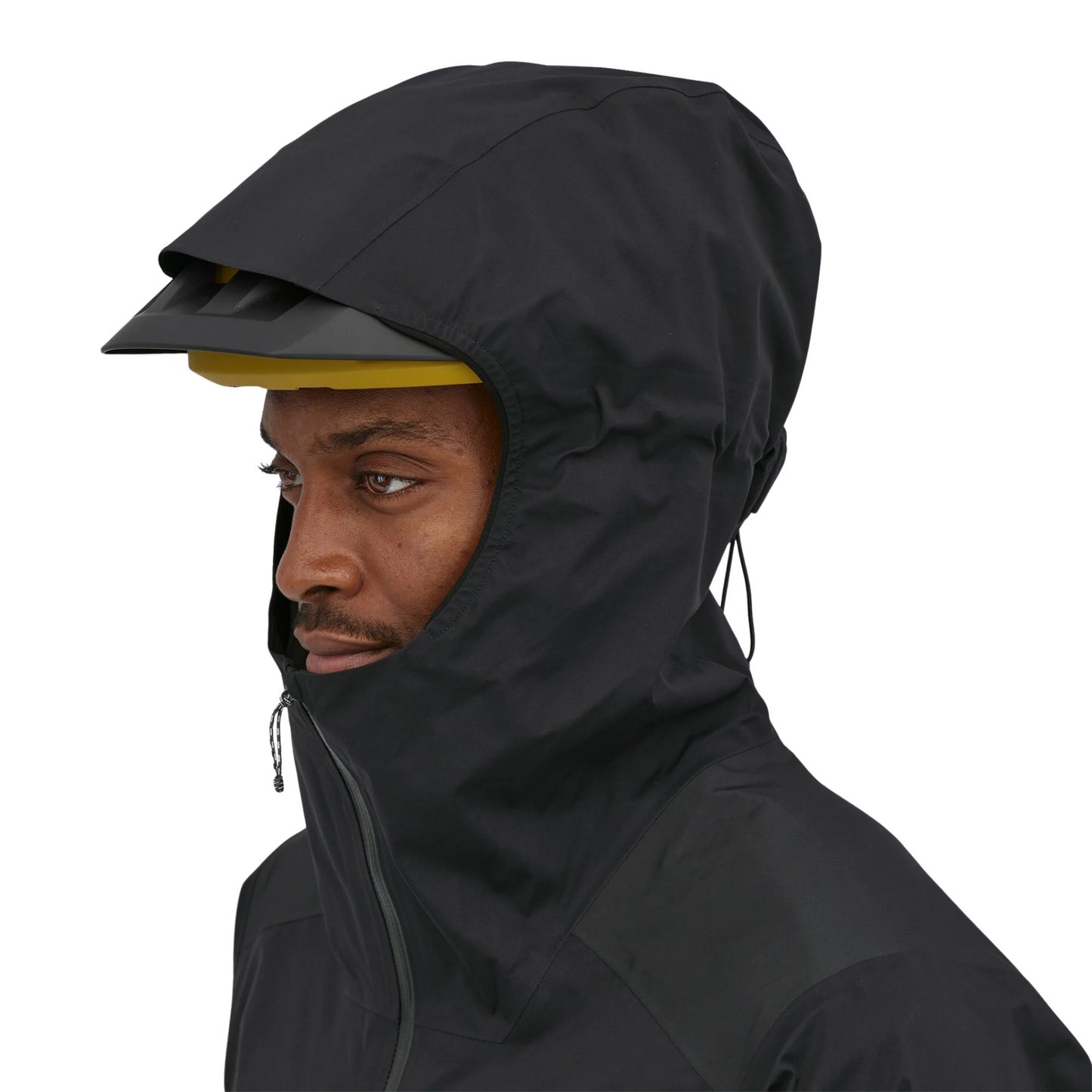 Patagonia Dirt Roamer Storm Bike Jacket in Black worn by model, hood detail
