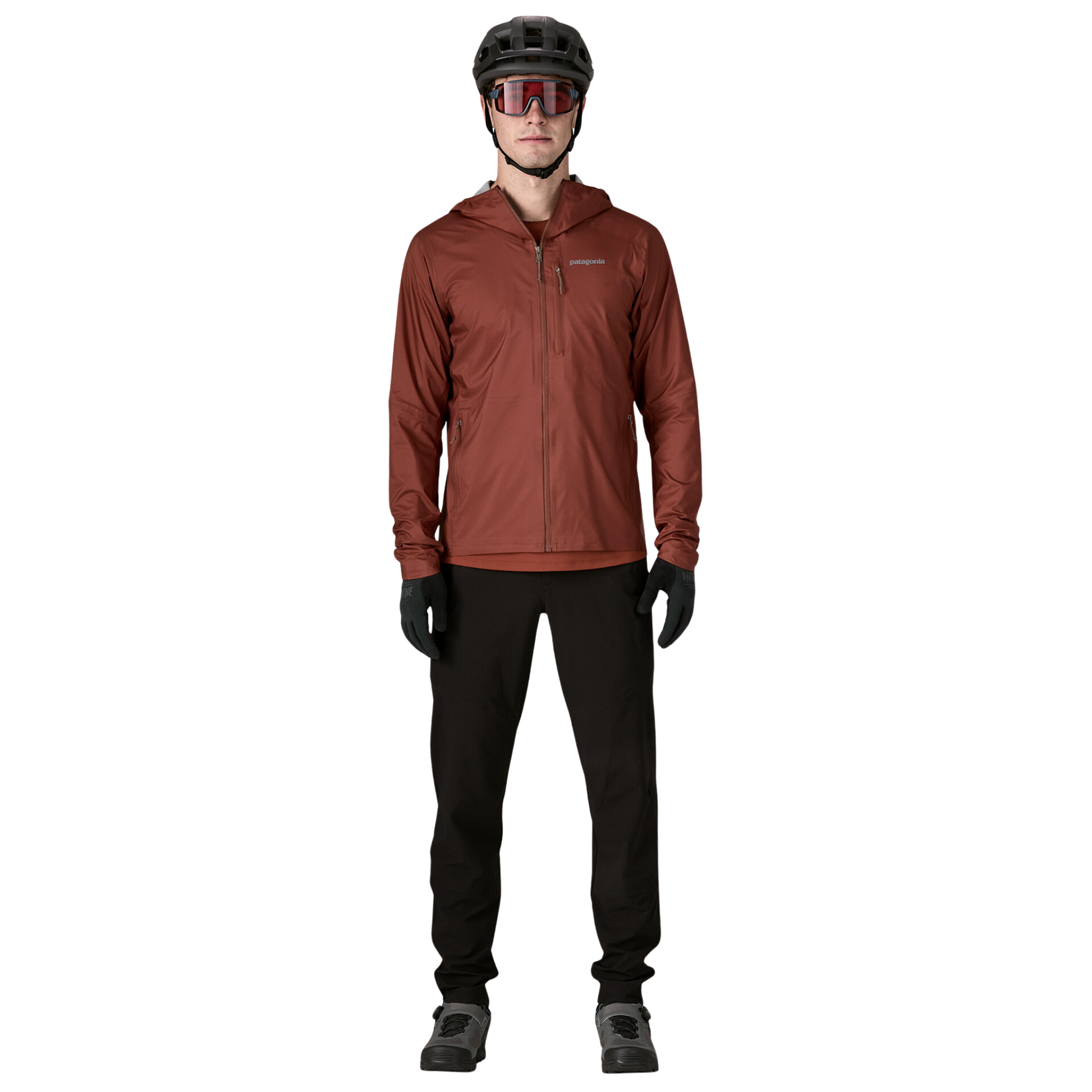 Patagonia Men’s Trail Craft Mountain Bike Jacket in Dried Vanilla being worn by cyclist