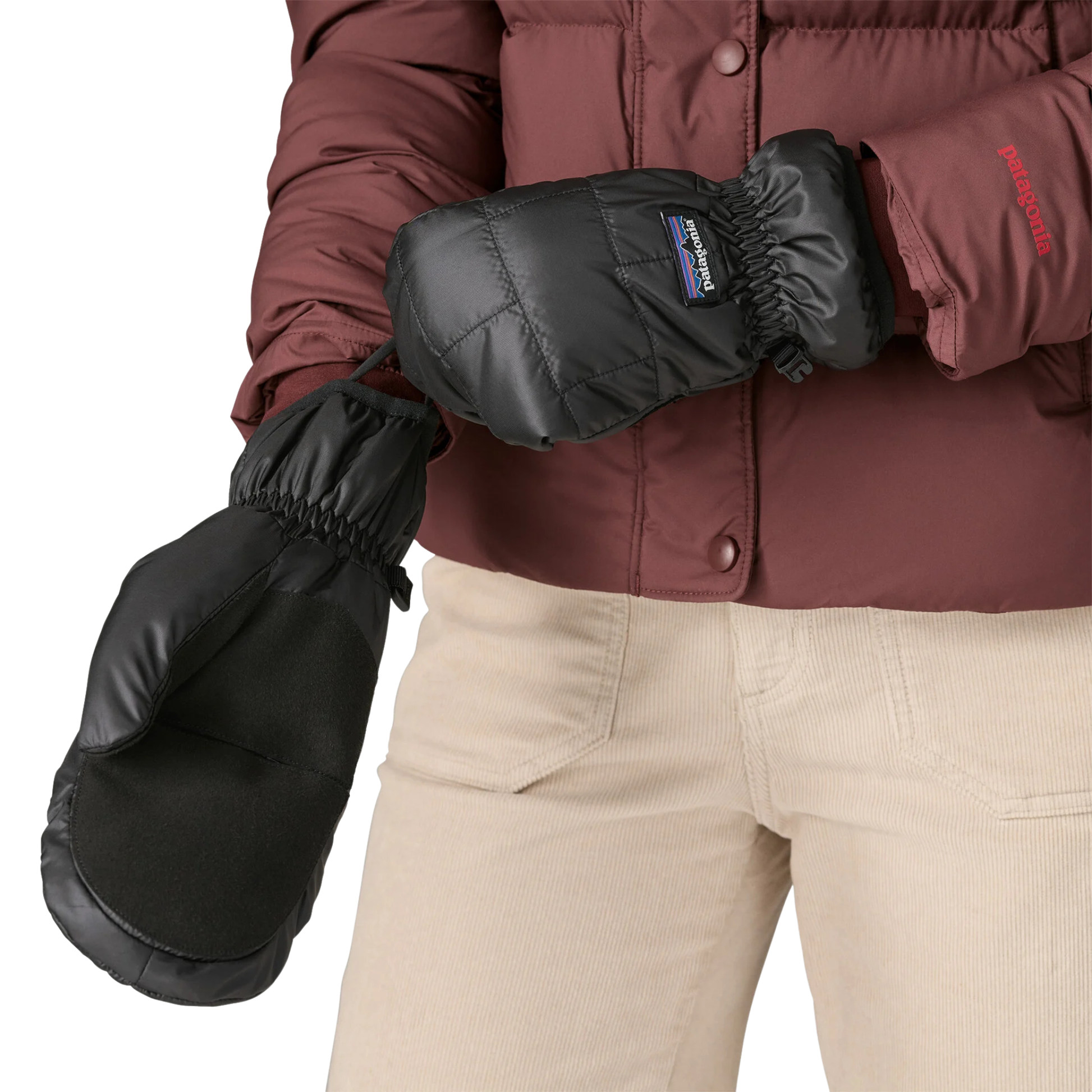 Model pulling on Patagonia Nano Puff Insulated Mittens