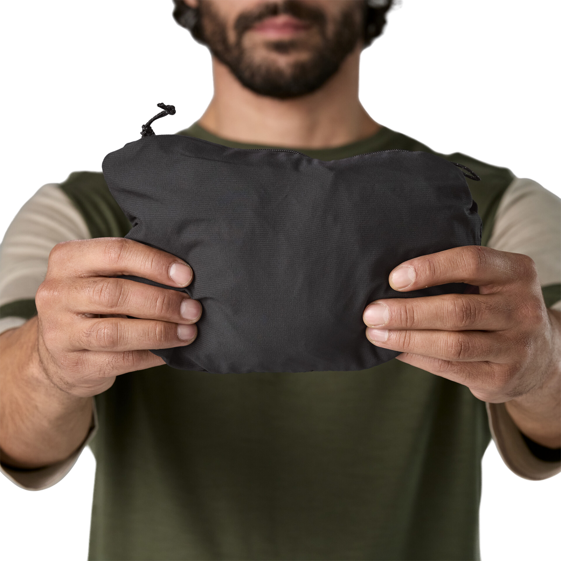 Patagonia Men's Trail Craft Vest in black, packed into its own pocket