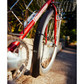 PDW Full Metal aluminum bicycle fenders installed on a red Bridgestone bike