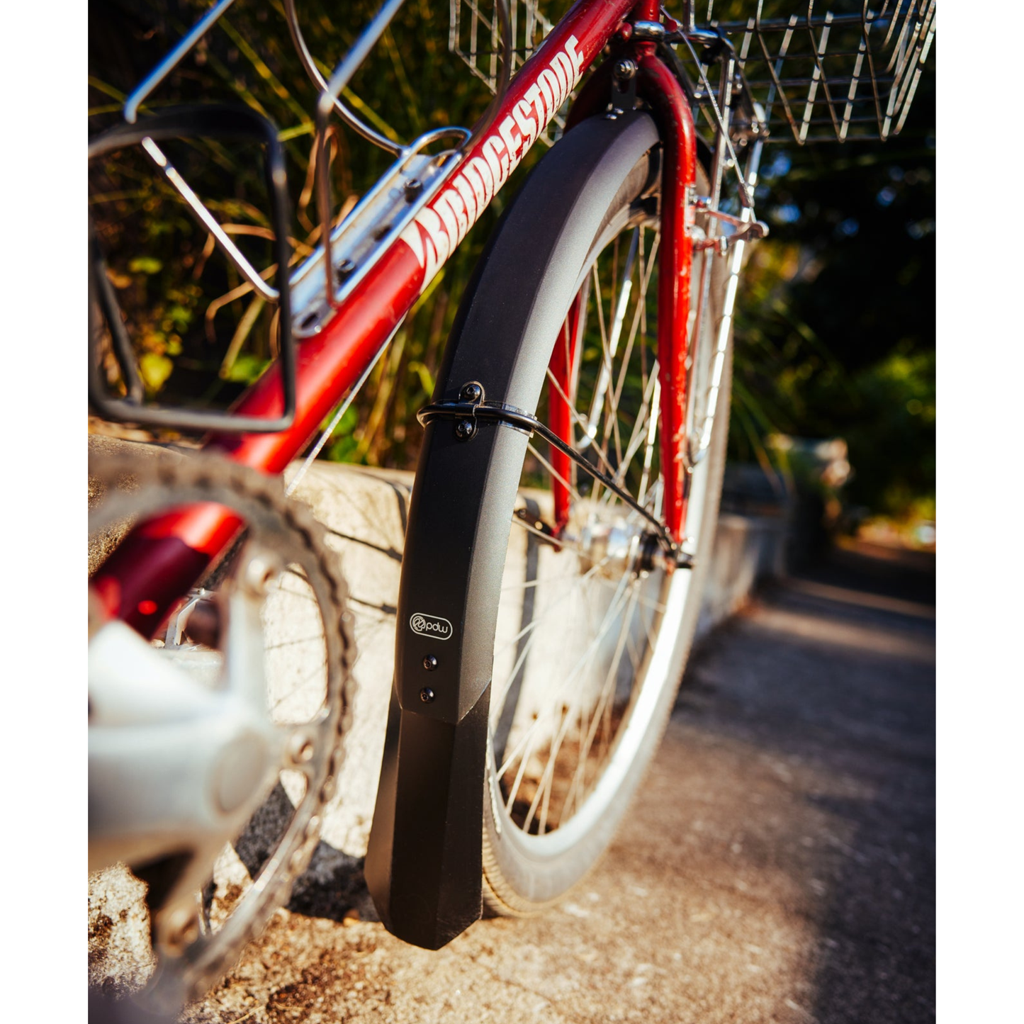 PDW Full Metal aluminum bicycle fenders installed on a red Bridgestone bike