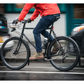 PDW Full Metal aluminum bicycle fenders installed and being ridden on a black bike in the rain