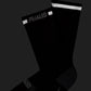 PEdALED Odyssey Merino Reflective unisex cycling socks featuring midweight wool-blend construction, light cushioning and reflective details.