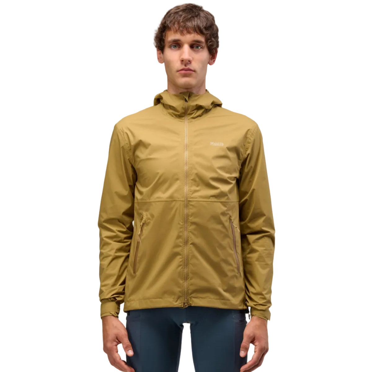 PEdALED Odyssey men's and women's waterproof cycling shell jacket featuring 2.5-layer laminated fabric, sealed seams, helmet-compatible hood and relaxed fit.