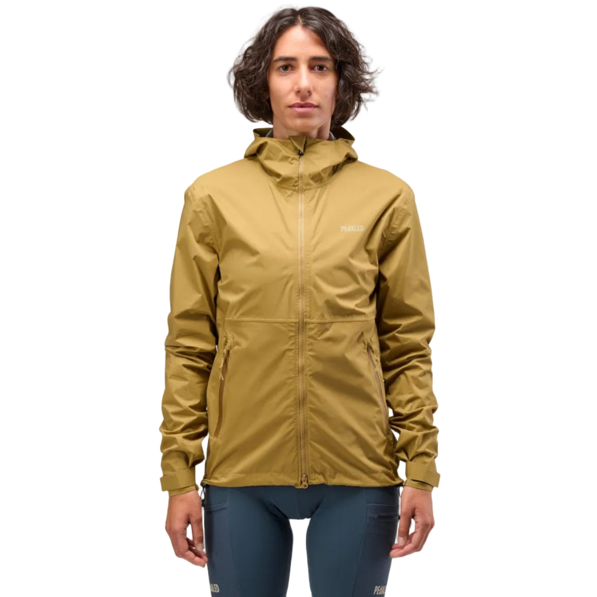 PEdALED Odyssey men's and women's waterproof cycling shell jacket featuring 2.5-layer laminated fabric, sealed seams, helmet-compatible hood and relaxed fit.