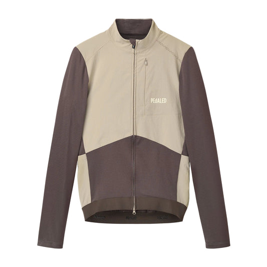 PEdALED Odyssey Windblock Merino long-sleeve men's cycling jersey with wind-blocking chest panels, seven storage pockets and reflective rear details.