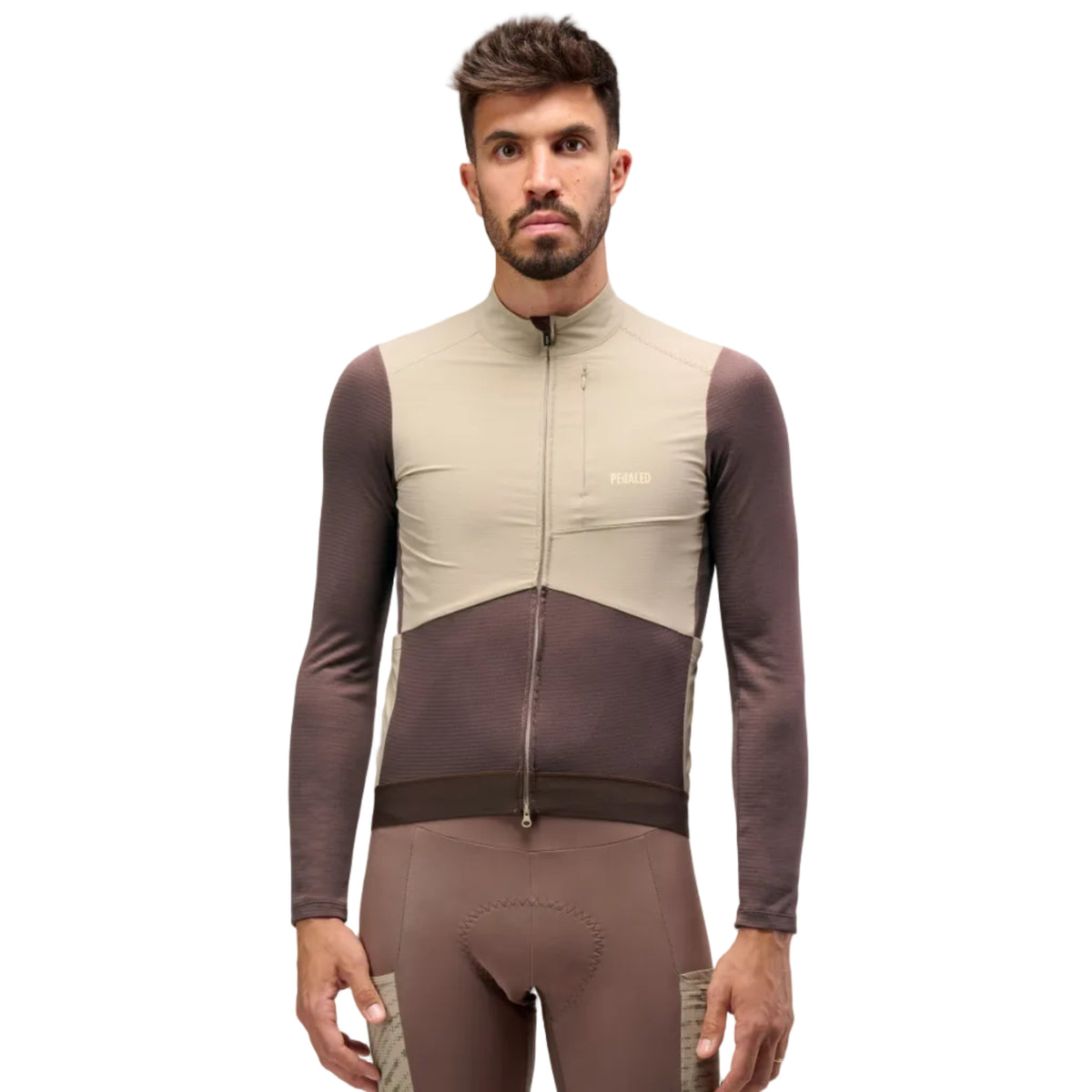 PEdALED Odyssey Windblock Merino long-sleeve men's cycling jersey with wind-blocking chest panels, seven storage pockets and reflective rear details.
