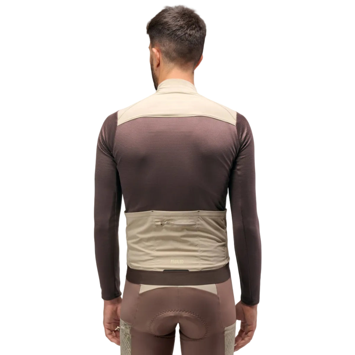 PEdALED Odyssey Windblock Merino long-sleeve men's cycling jersey with wind-blocking chest panels, seven storage pockets and reflective rear details.