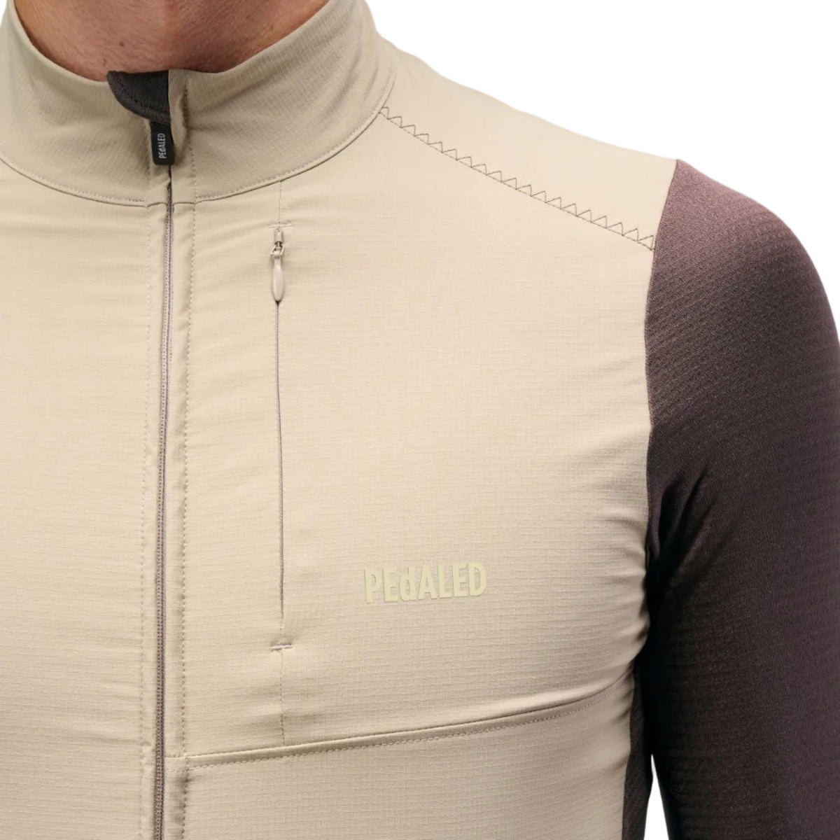 PEdALED Odyssey Windblock Merino long-sleeve men's cycling jersey with wind-blocking chest panels, seven storage pockets and reflective rear details.