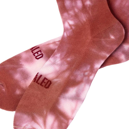 PEdALED Yama Tie-Dye unisex cycling socks featuring a colourful tie-dye pattern and breathable cotton-blend construction.