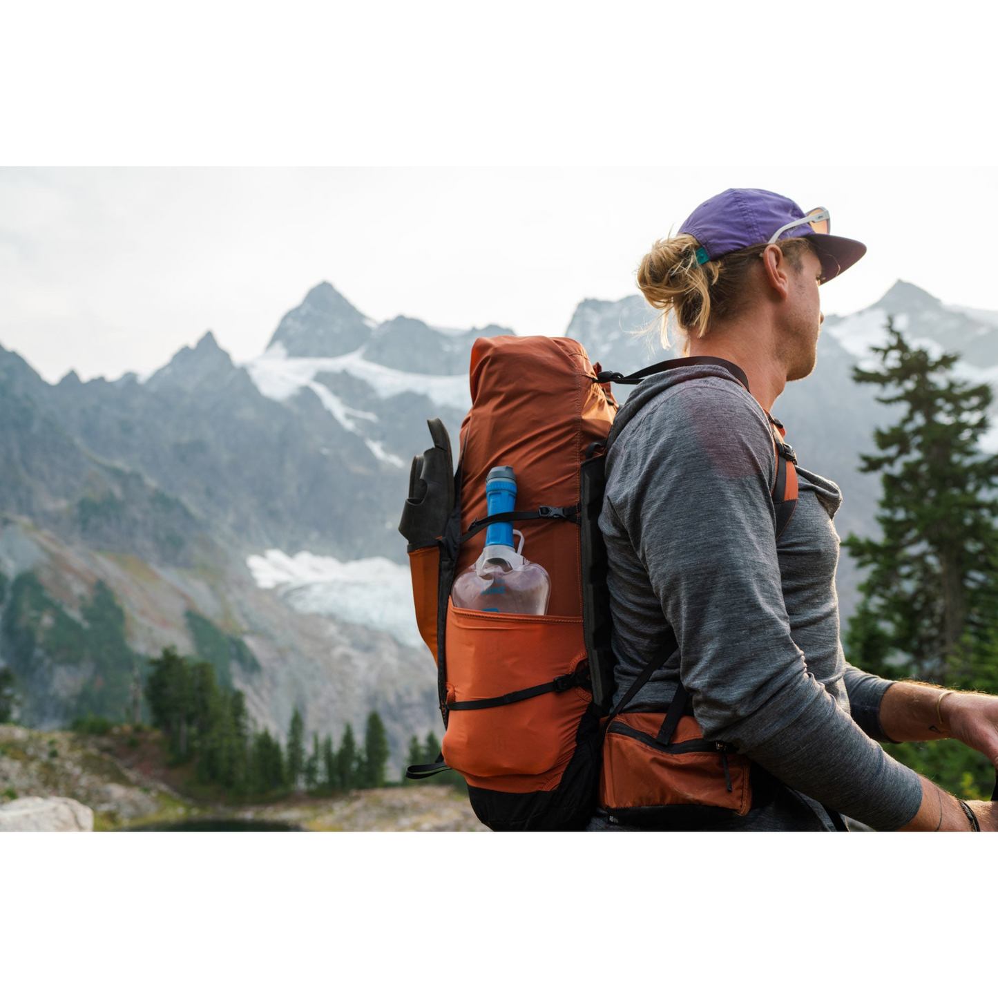 Platypus QuickDraw 1L Filter System  filled with water and packed in side pocket of back pack