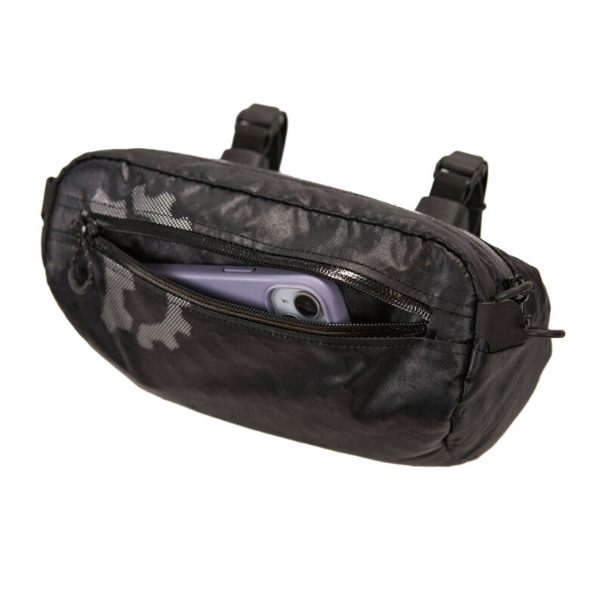 Revelate Designs Campamocha handlebar bag front view with the front pocket opened and a phone showing inside