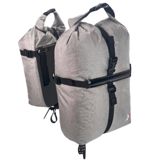 Revelate Designs Nano Panniers 2026 version both panniers filled and closed in front or each other 
