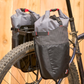 Revelate Designs Portage Panniers installed on a back, diagonal rear view