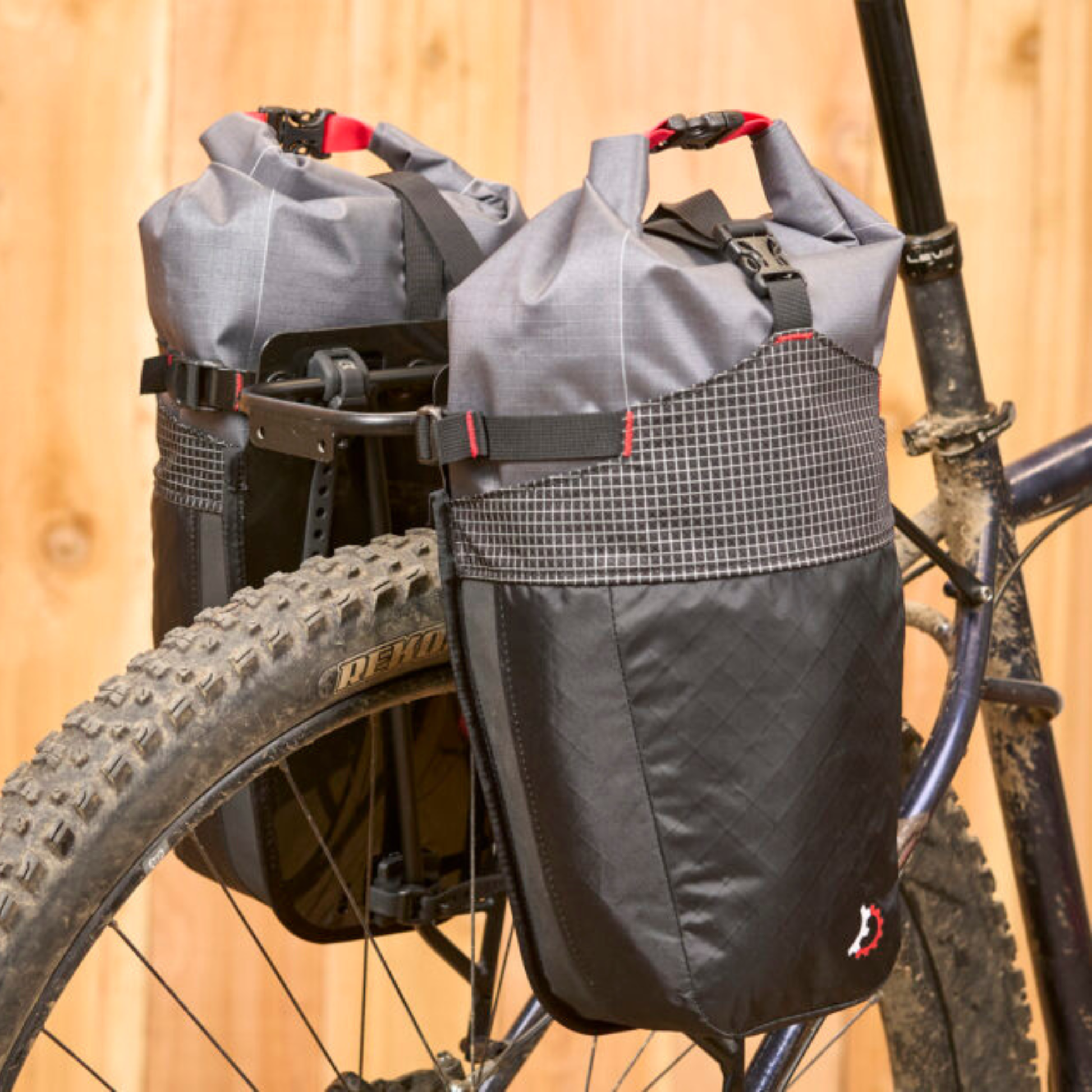 Revelate Designs Portage Panniers installed on a back, diagonal rear view